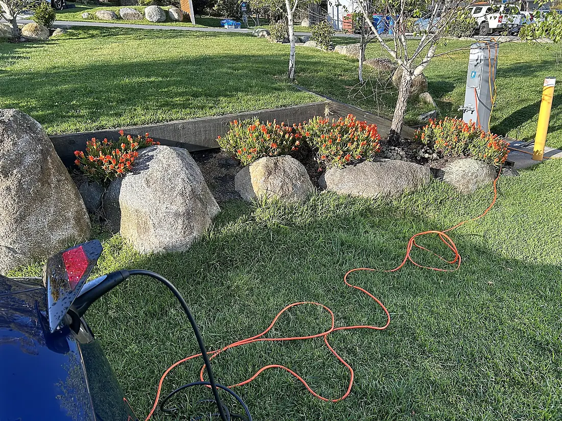 Tesla Model 3 charging at Tasman Holiday Park, St Helens, Tasmania